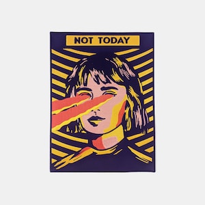 Op de afbeelding: Een paarse patch met gele en oranje strepen. Een vrouw met donker haar en roze huid wordt getoond met haar ogen dicht. De tekst "NOT TODAY" staat op een gele banner bovenaan de patch.