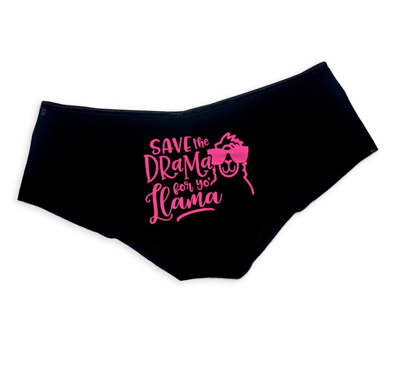 May include: Black underwear with a pink graphic print of a llama wearing sunglasses and the text "Save the drama for yo' llama".