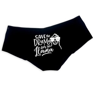 May include: Black underwear with a white graphic print of a llama wearing sunglasses and the text "Save the drama for yo' llama".