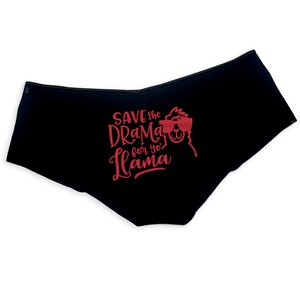 May include: Black underwear with a red graphic print of a llama wearing sunglasses and the text "SAVE the DRAMA for yo' LLAMA".