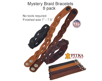 May include: A collection of braided leather bracelets in various shades of brown and black. The bracelets have snap closures and are labeled "Mystery Braid Bracelets, 8 pack." Finished size is 7" - 7.5". The product is made in the USA.