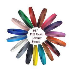 May include: A selection of 3/8" full-grain leather straps in a variety of colours, arranged in a circular design. The straps include shades of red, green, blue, pink, and yellow, set against a white backdrop.