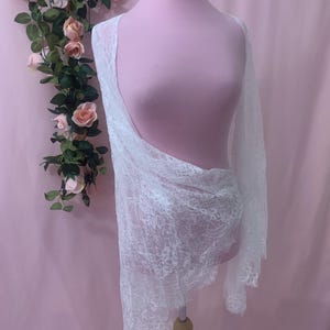 Dramatic shot of the extra wide sleeve hem measuring 55 inches in circumference, creating a flowing vintage silhouette.
