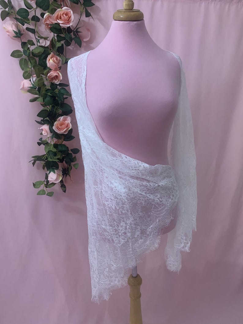 Dramatic shot of the extra wide sleeve hem measuring 55 inches in circumference, creating a flowing vintage silhouette.