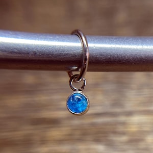 Single Apatite Charm Earring on Seamless Hoop, Handmade Sterling Silver Sleeper Huggie Hoop with Bezel Set Cabochon Blue Gemstone