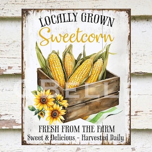 May include: A rustic wooden sign with the words "LOCALLY GROWN Sweetcorn" in black and yellow. The sign features an illustration of corn cobs in a wooden crate, sunflowers, and the text "FRESH FROM THE FARM Sweet & Delicious - Harvested Daily."