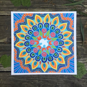 May include: A colorful mandala design with a white dove in the center. The mandala is surrounded by a circle of words, including "love", "joy", "peace", "patience", "kindness", "goodness", "faithfulness", "gentleness", and "self-control".