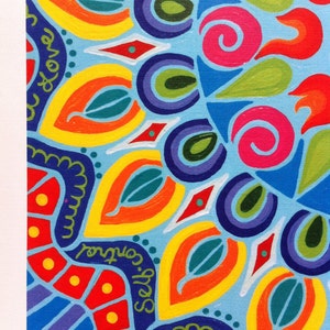 May include: A colorful mandala painting with a blue background. The mandala features a variety of shapes and patterns, including circles, triangles, and leaves. The painting is decorated with the words "Self Control" and "You Love".
