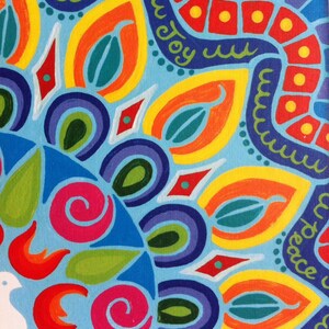May include: A colorful mandala design with a blue background. The design features a variety of shapes and colors, including red, orange, yellow, green, blue, and purple. The word "joy" is written in a curved line in the upper right corner of the design.
