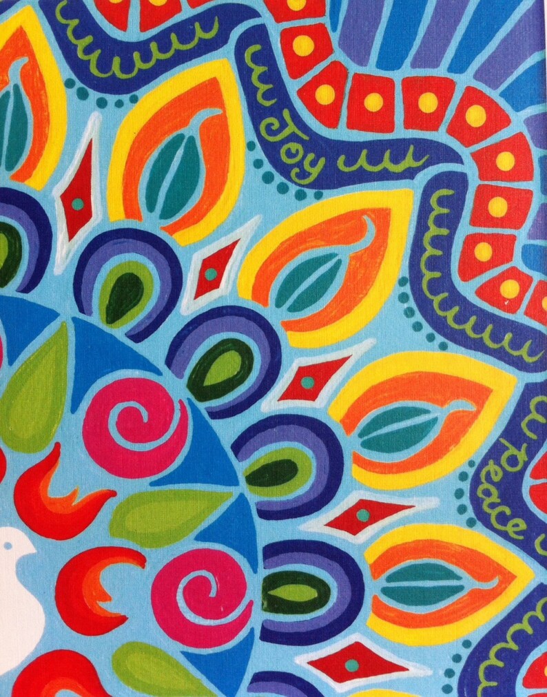 May include: A colorful mandala design with a blue background. The design features a variety of shapes and colors, including red, orange, yellow, green, blue, and purple. The word "joy" is written in a curved line in the upper right corner of the design.