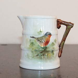 Royal Worcester Barrel Style Creamer with Bird Motif