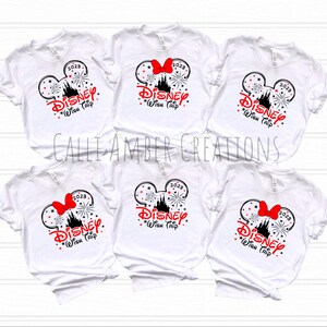 May include: Five white t-shirts with a black and red graphic design of Mickey Mouse ears with a red bow, fireworks, and the text "2023 DISNEY Wish Trip".
