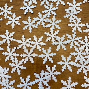 White snowflakes, snowflake confetti, snowflake party