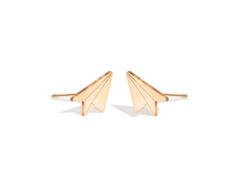 May include: A pair of gold-toned paper airplane stud earrings.