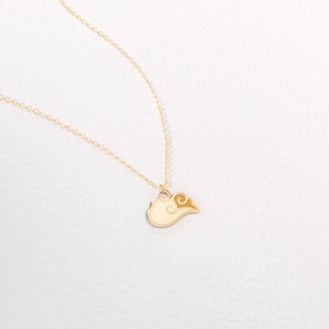 May include: A gold-colored necklace featuring a cloud pendant. The pendant has a cream-colored base with a gold swirl design. The chain is delicate and also gold-colored. The necklace is displayed on a white background.