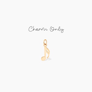 Puede incluir: Encanto de nota musical de oro. Solo encanto.