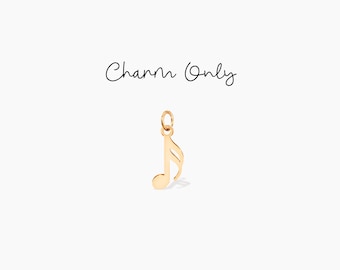 Pode incluir: Encanto de nota musical de ouro. Apenas encanto.