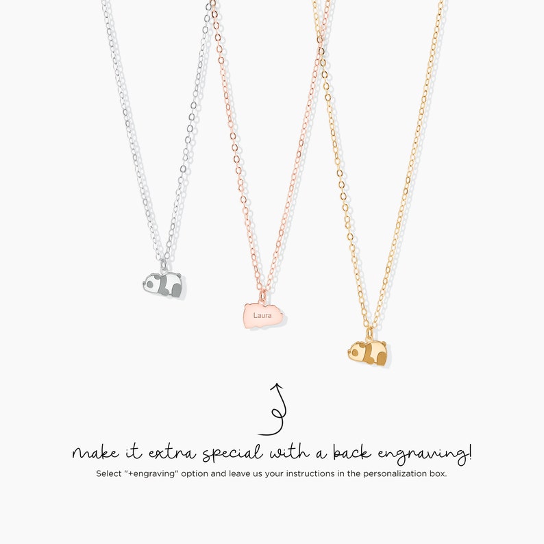 May include: Three necklaces with different pendants: a panda, a state-shaped pendant with the name "Laura", and a panda. The chains are silver, rose gold, and gold. The text says "make it extra special with a back engraving!"