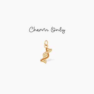 Könnte beinhalten: Goldfarbener DNA-Doppelhelix-Anhänger. Charm Only.