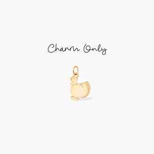 Puede incluir: Encanto de oro en forma de pavo. Charm Only.