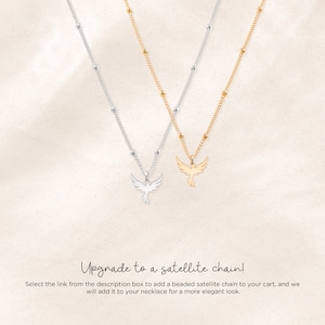 May include: Two delicate necklaces with a small bird pendant. One necklace is silver with a silver bird pendant, and the other is gold with a gold bird pendant. The necklaces are on a white background. Upgrade to a satellite chain! Select the link from the description box to add a beaded satellite chain to your cart, and we will add it to your necklace for a more elegant look.