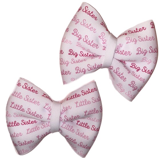 Big & Little Sister Bows in pinks.  Little Sister on Newborn Hat or Nylon Headband. Big Sister is on clip or Nylon Headband. You Choose