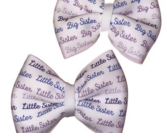 Big & Little Sister Bows in purples.  Little Sister on Newborn Hat or Nylon Headband. Big Sister is on clip or Nylon Headband. You Choose