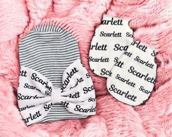 Baby Bow Name Hat. Newborn Size Black and White Stripe Hat. Option to add Mitts Name in Black.