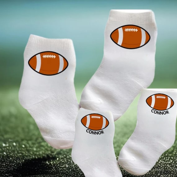 Football socks for Baby, Toddler, Child. Multiple sizes offered. Option to add name on them. Choose from 0-6  months to 10 years.