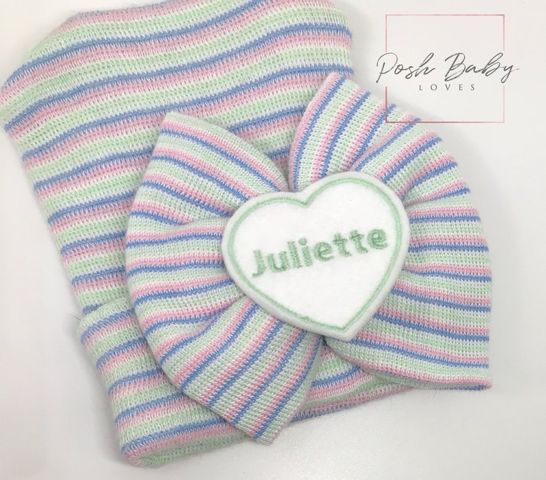 Mint, blue and pink stripe hat with name in mint on white heart