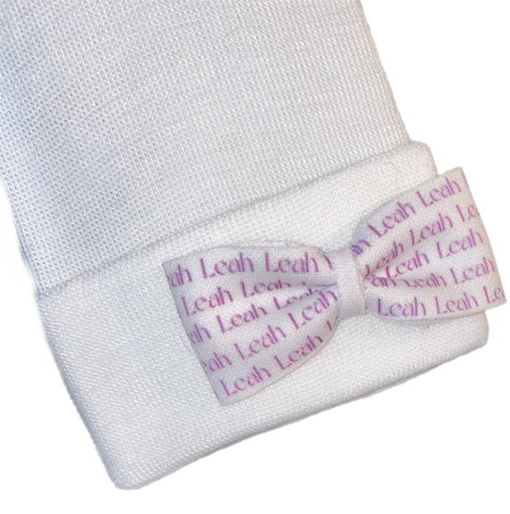 Newborn hat with small bow with name. You choose hat and name color
