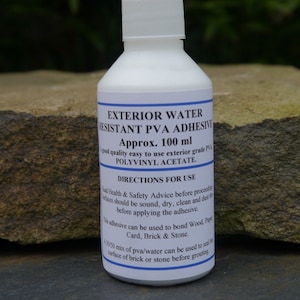 May include: A white bottle of exterior water resistant PVA adhesive. The bottle is labeled with the text "EXTERIOR WATER RESISTANT PVA ADHESIVE" and "Approx. 100 ml".