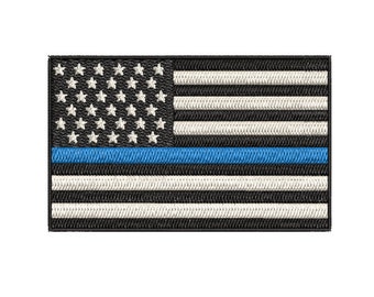 May include: An embroidered American flag patch with a thin blue line across the middle, representing support for law enforcement.