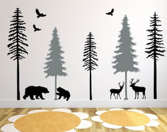 May include: Black and gray silhouette wall decals featuring a forest scene with trees, bears, deer, and birds. The decals are perfect for adding a touch of nature to any room.