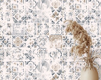 May include: A decorative wall with a repeating pattern of square tiles in shades of white, blue, and tan. The tiles have a distressed, vintage look. A wooden cabinet with a woven front and a vase with dried plants are in the foreground.