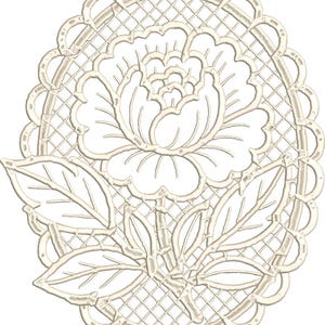 May include: Cream-colored floral embroidery design featuring a central flower with detailed petals, surrounded by leaves and stems. The design is enclosed within an oval frame with a scalloped edge and a lattice background, suitable for crafts.