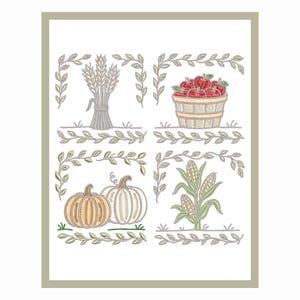 Op de afbeelding: Een ingelijste illustratie met herfstelementen. Het toont een bundel tarwe, een mand met rode appels, twee pompoenen en maïskolven. Elk element is omgeven door een decoratieve bladergrens, wat een seizoensgebonden thema oproept.