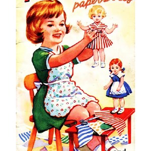 May include: Vintage illustration of a girl with red hair holding a paper doll. The image features the text "PAMELA and her paper Dolls" in red and gold. The girl is wearing a green dress and a floral apron, with two paper dolls and a small table.