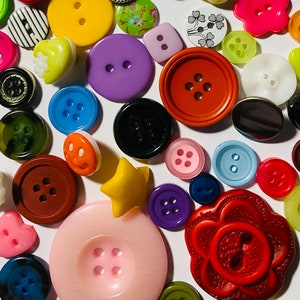 Assorted buttons in batches of 50
