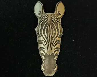 Headbadge for bicycle. Zebra bycicle insignia. Brass.