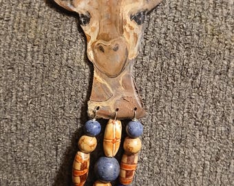 Ornamento animale totem giraffa spirituale
