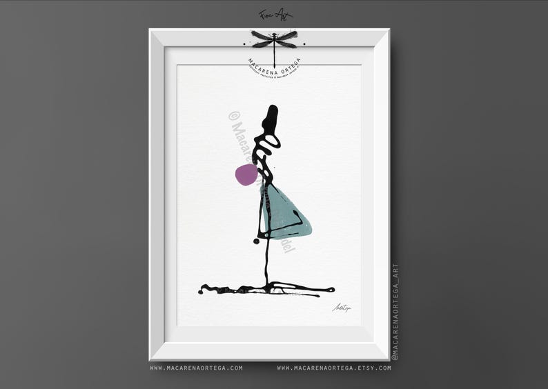 May include: Abstract art print in a white frame. The artwork features a minimalist figure with black ink lines, a purple sphere, and a teal triangle. The artist's signature is at the bottom. The frame has the artist's name and website.