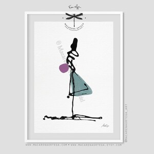 May include: Abstract art print in a white frame. The artwork features a black, teal, and purple figure on a white background. The artist's signature is at the bottom. The print includes the text "Macarena Ortega" and website addresses.