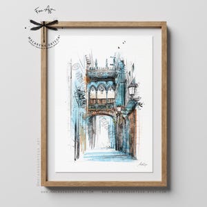 May include: Watercolor painting of an arched architectural structure in shades of blue, brown, and white, framed in a wooden frame. The artwork features a detailed depiction of a building with arched windows and street lamps, with the text "Fine Art" and the artist's name.