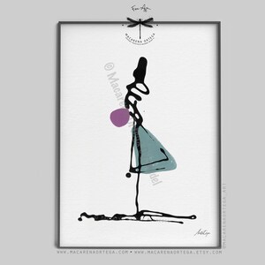 May include: Abstract art print featuring a black ink figure with a purple sphere and a teal triangle shape. The artwork is framed in a black frame and set against a white background. The artist's signature is visible.