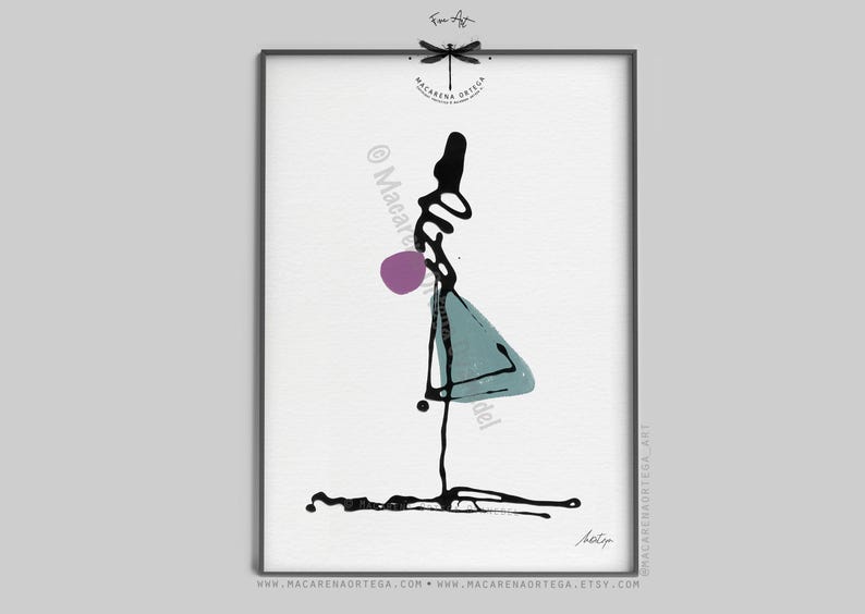 May include: Abstract art print featuring a black ink figure with a purple sphere and a teal triangle shape. The artwork is framed in a black frame and set against a white background. The artist's signature is visible.
