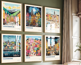 May include: Six colorful framed prints of cityscapes with the names of the cities at the bottom of each print. The cities are Innsbruck, Odense, Ghent, Hamburg, Nice, and Edinburgh.