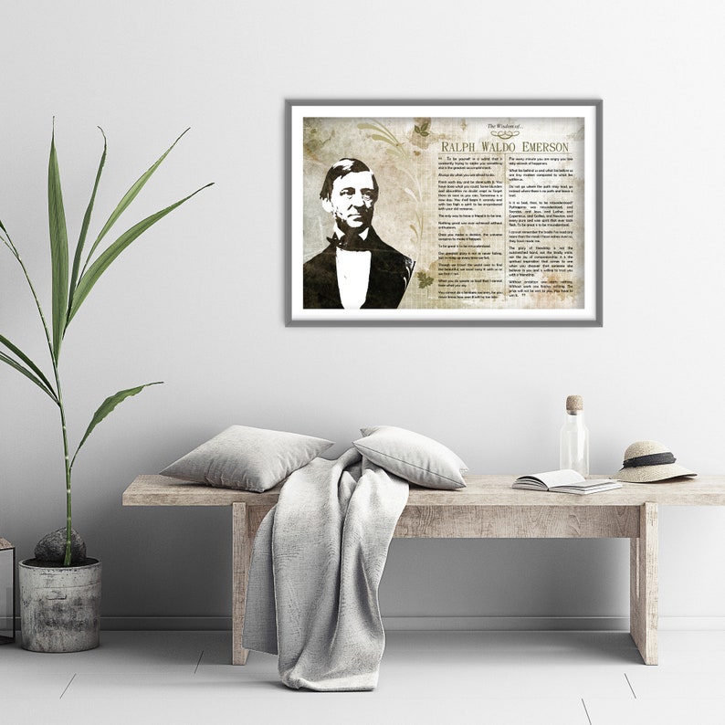 May include: A framed print with a vintage aesthetic featuring a black and white portrait of Ralph Waldo Emerson. The print includes a quote from Emerson, "To be yourself in a world that is constantly trying to make you something else is the greatest accomplishment."
