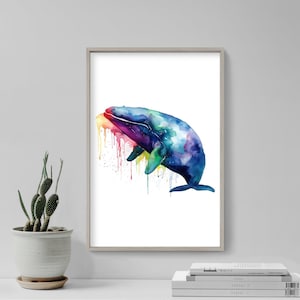 May include: A white ceramic mug with a black handle and the text "But First, Coffee" in a black, handwritten-style font. The mug is on a white surface.