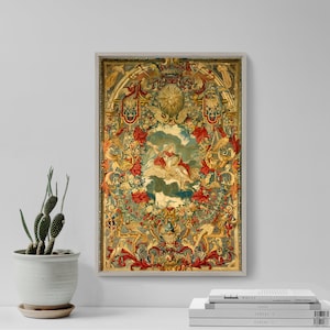 May include: Framed tapestry with a detailed, ornate design. The artwork features a central scene of a figure riding a winged creature, surrounded by floral and foliate motifs in red, gold, and green. The frame is a light gray color.